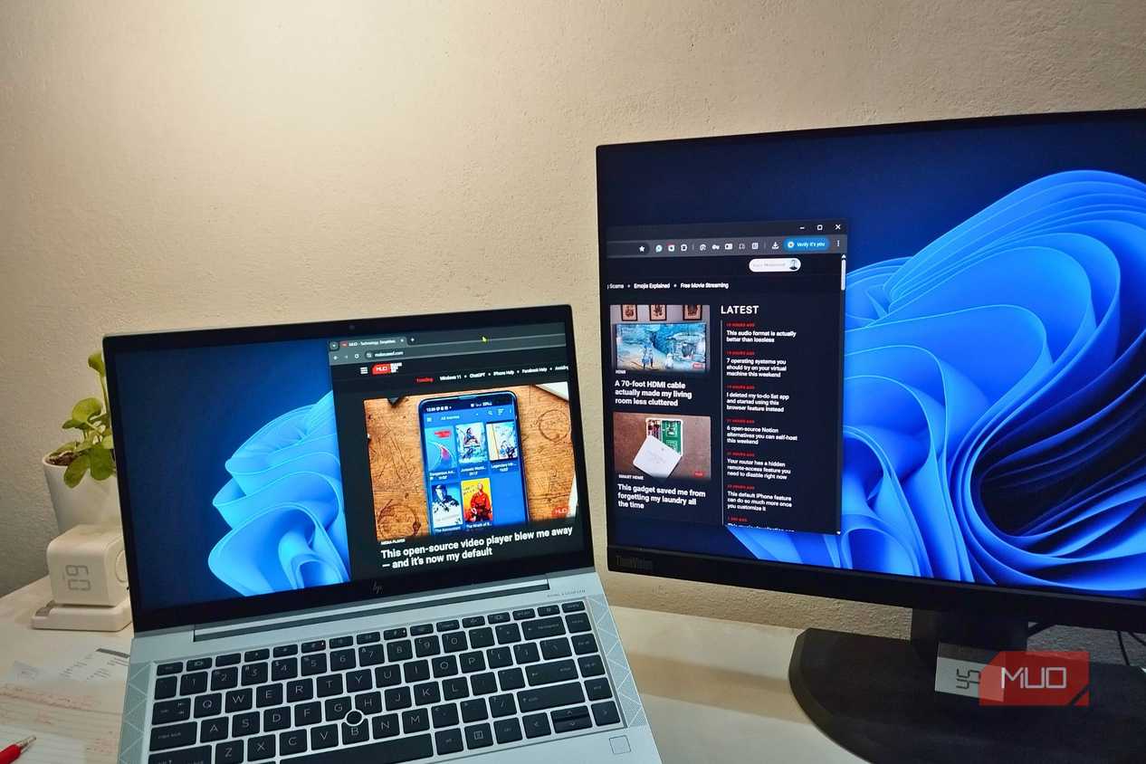 A monitor using a laptop as an extended display though Spacedesk showing MUO website.
