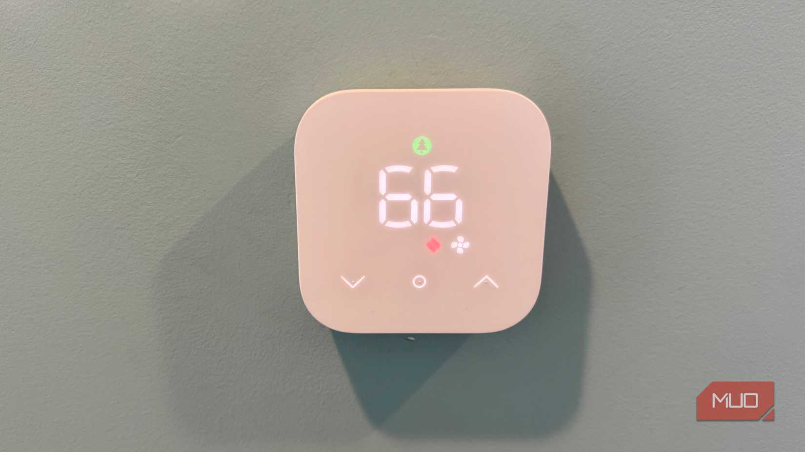 amazon smart thermostat on wall showing fan running