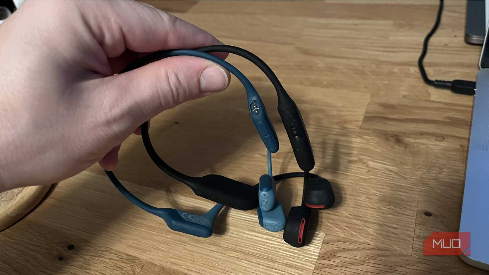 The charging ports for two pairs of bone conduction headphones