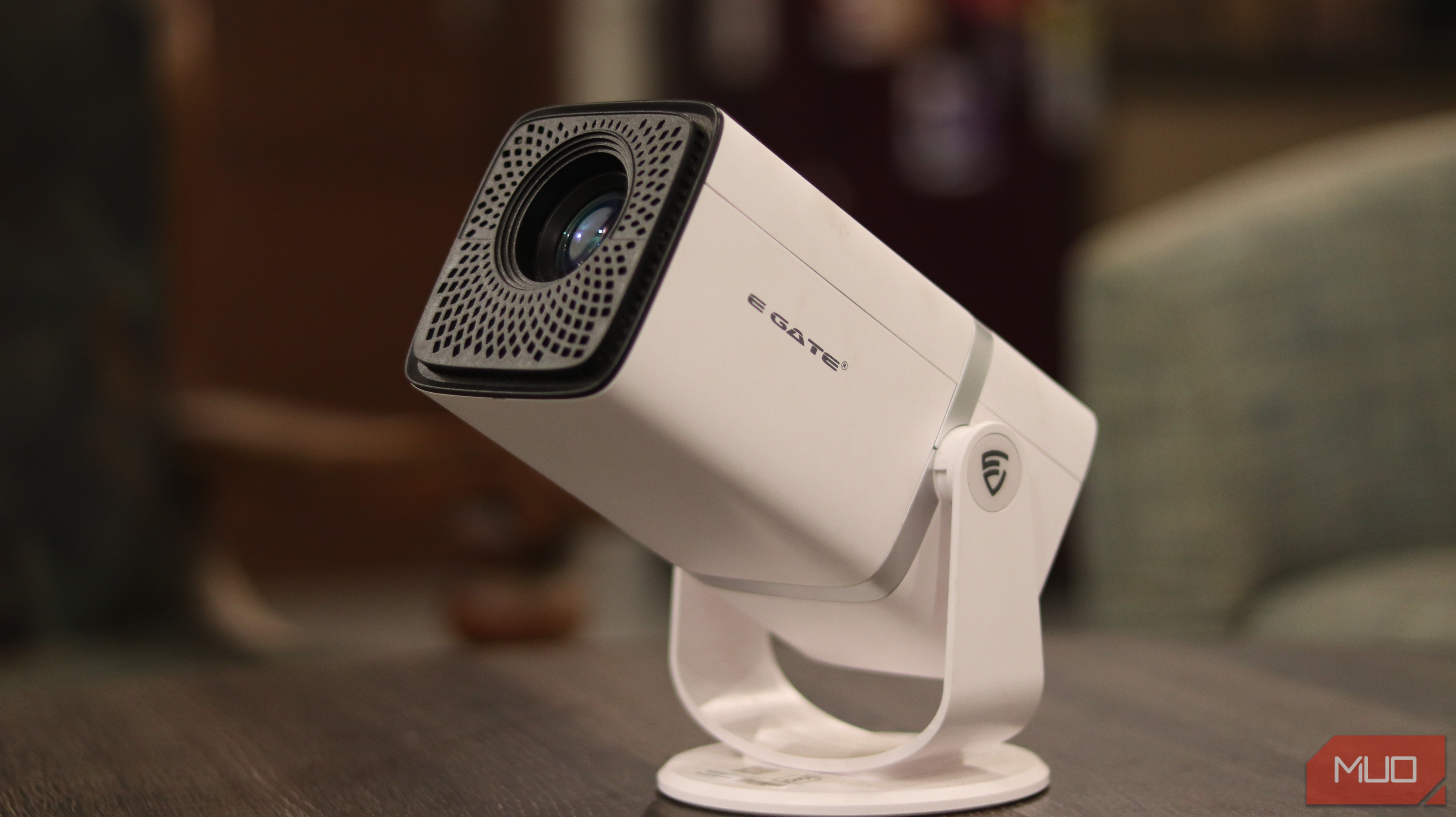 E-gate projector sitting on a table.