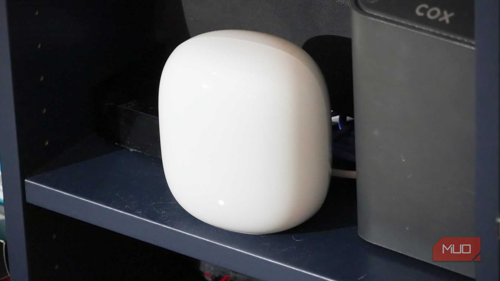 The Nest Wi-Fi Pro plugs into the front of the Coax modem/router combo.