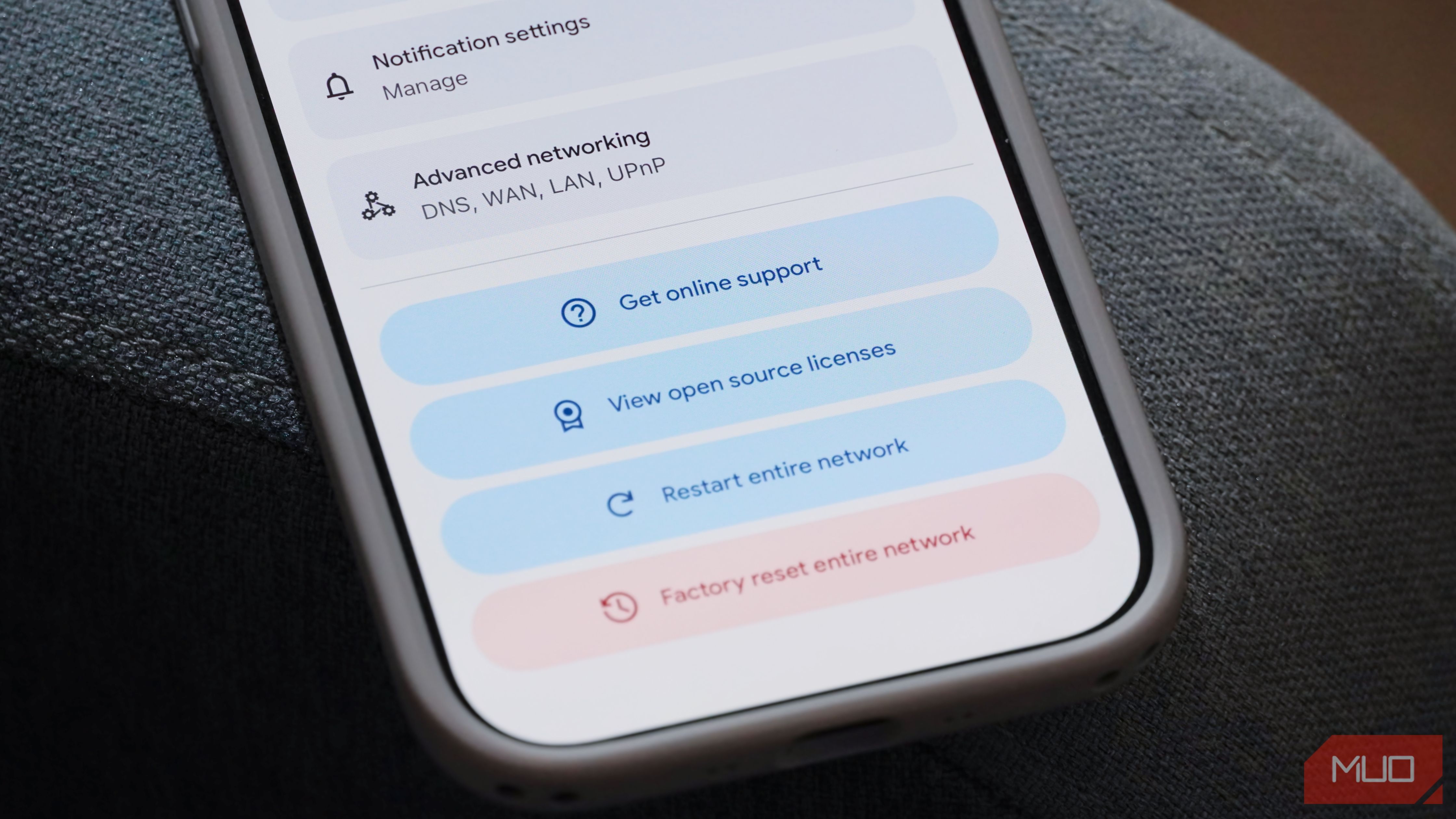 The restart button for the Google Nest Wi-Fi Pro.