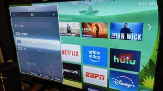 The HDMI-CEC source on a TV with Roku in the background