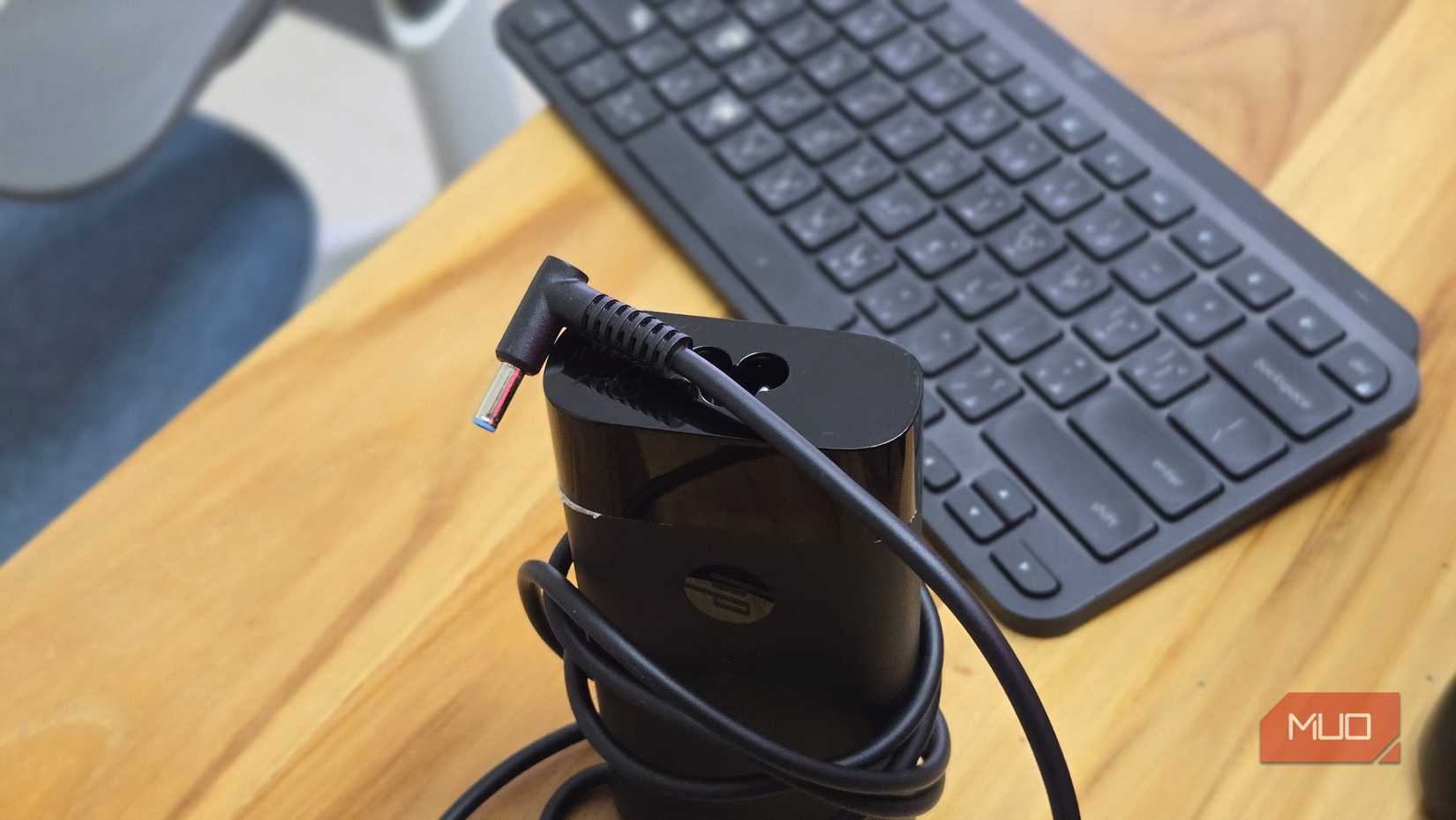 Hp Laptop charger with the cable wrapped around