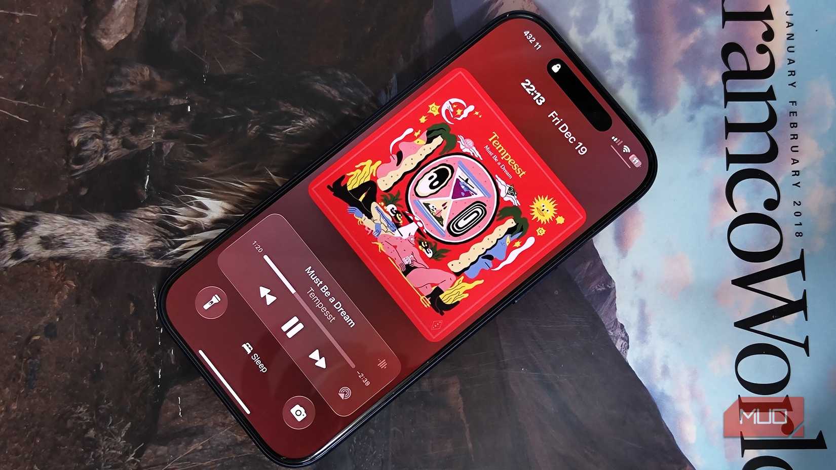 iPhone 17 Pro lock screen showing music on Spotify