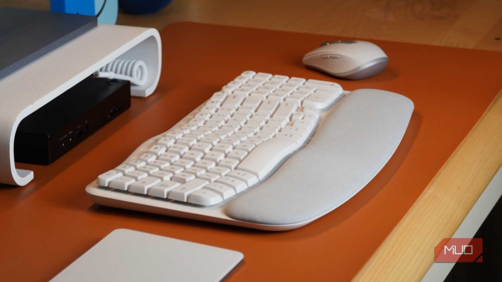 A wide shot of the Logitech Wave Keys ergonomic keyboard on a desk.