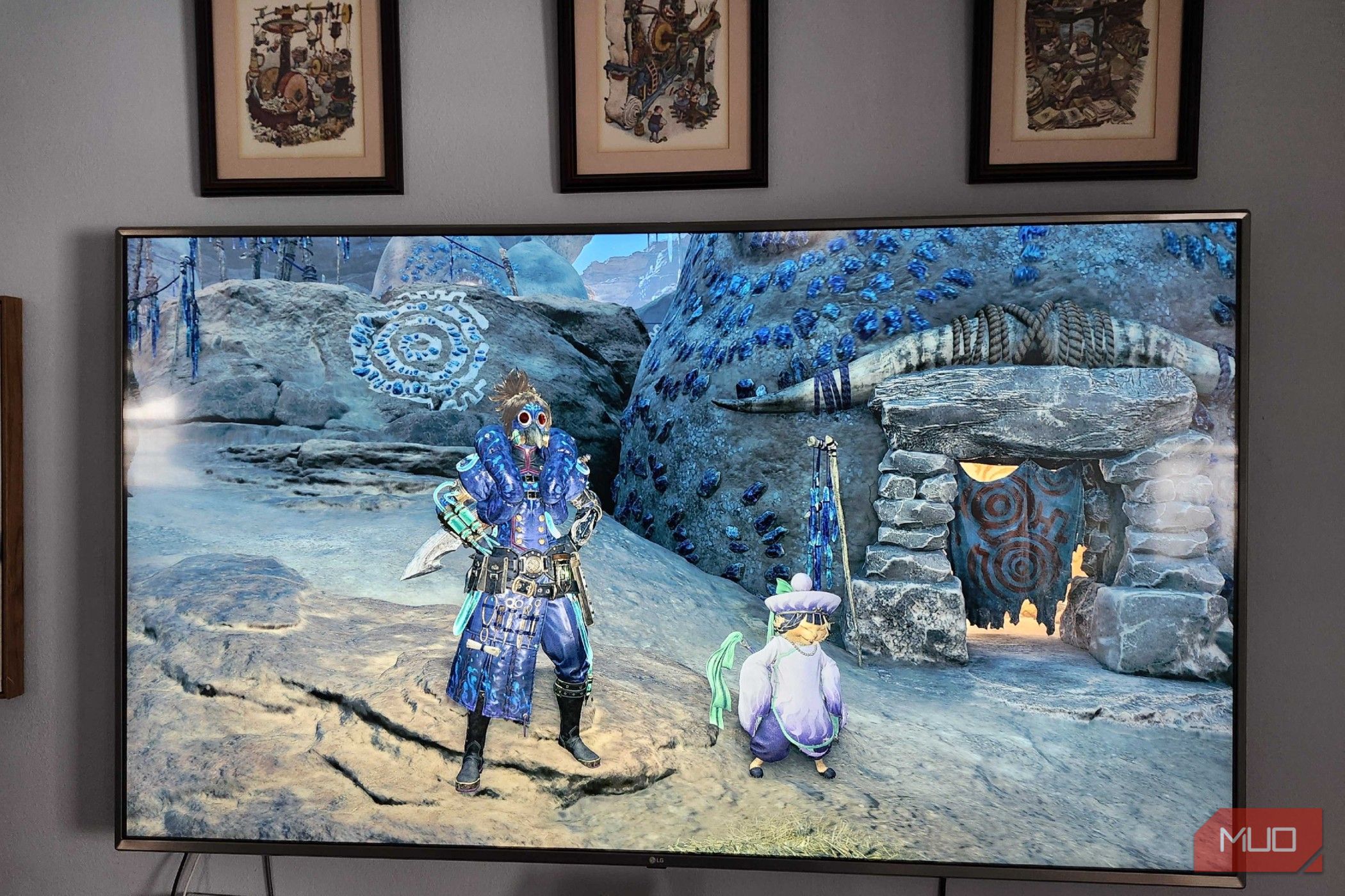 Monster Hunter Wilds playing on PlayStation 5 in my office, but displayed on living room TV