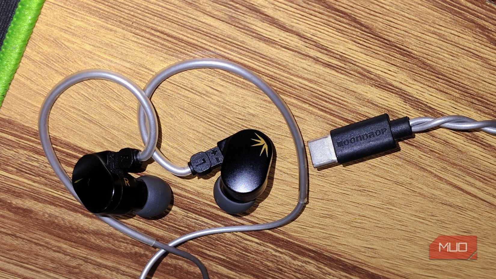 Moondrop Chu 2 DSP on a wooden desk with Type-C connector visible.