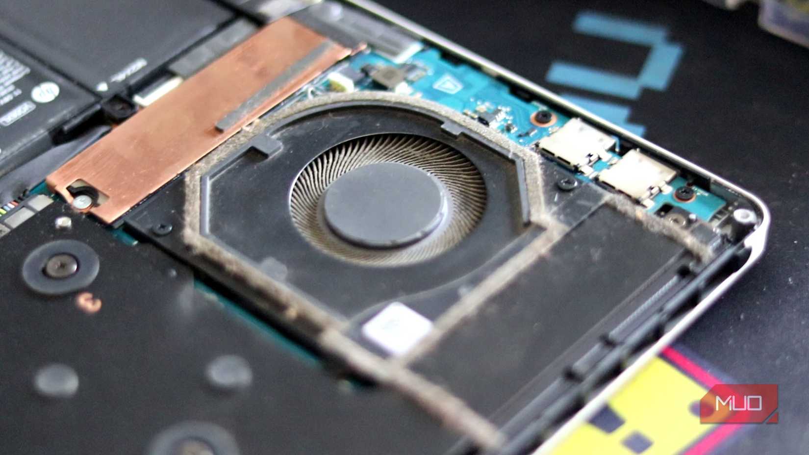 Old laptop fan on motherboard.