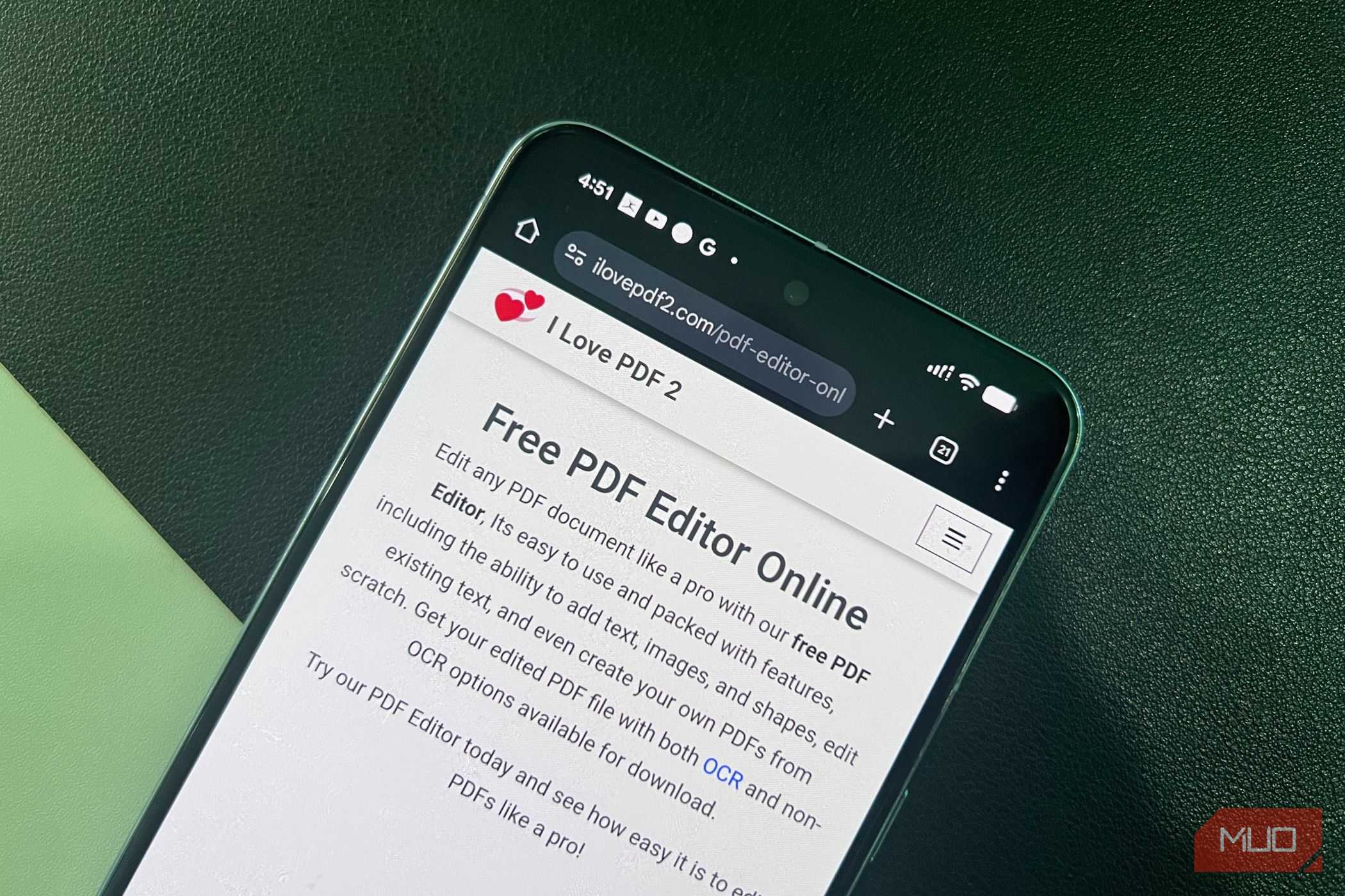 Phone with browser open displaying I Love PDF 2