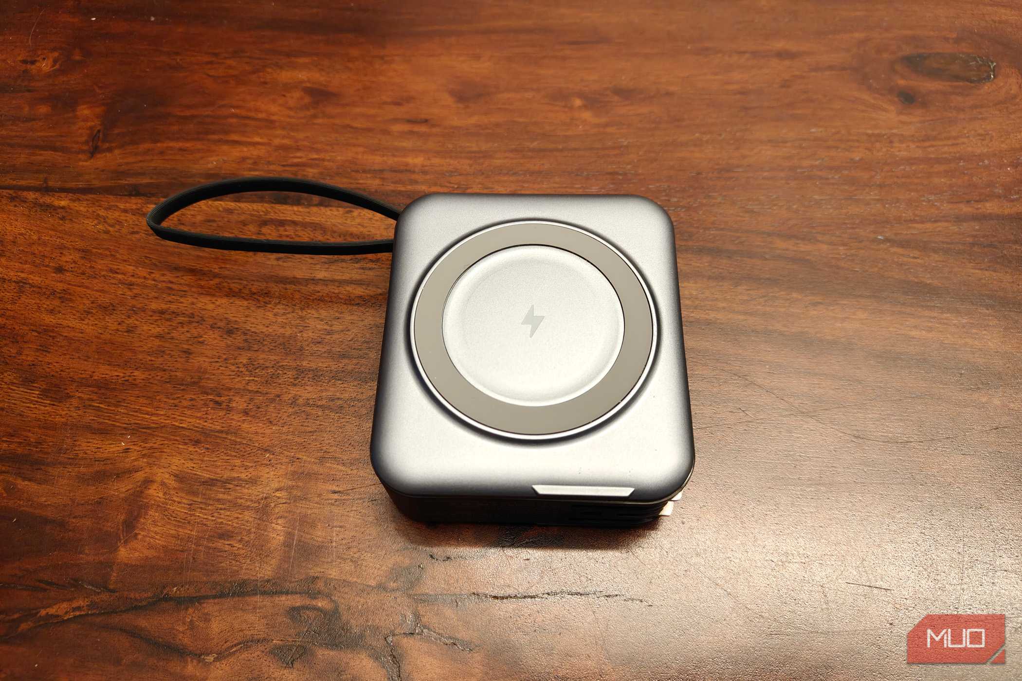 A square power bank on a table.