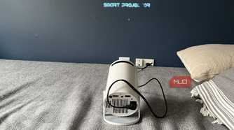 Turning on the Magcubic Auto Keystone Mini Portable Projector