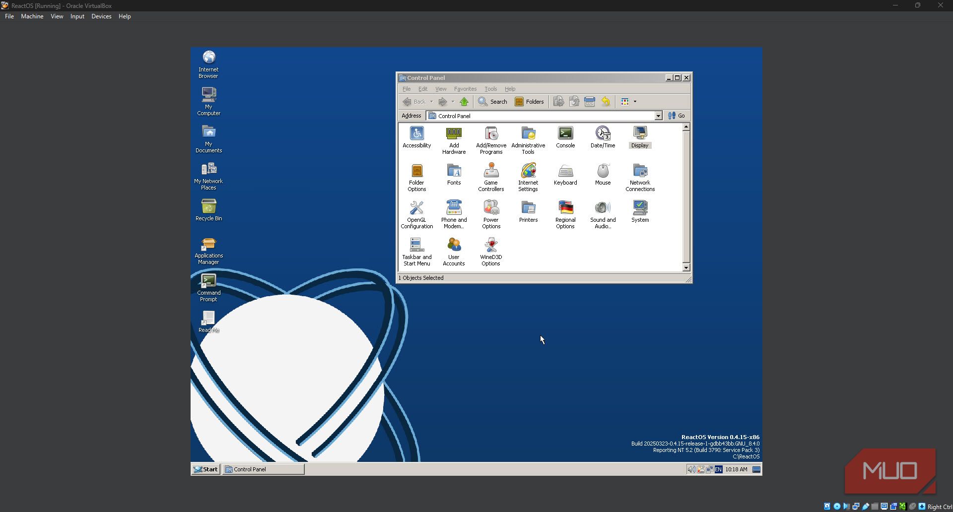 ReactOS with Control Panel open.