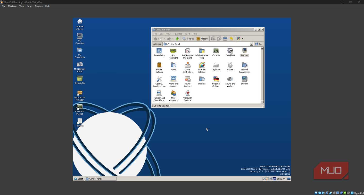 ReactOS with Control Panel open.