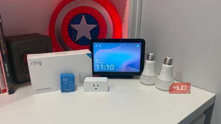 several smart home gadgets on desk with echo show 8