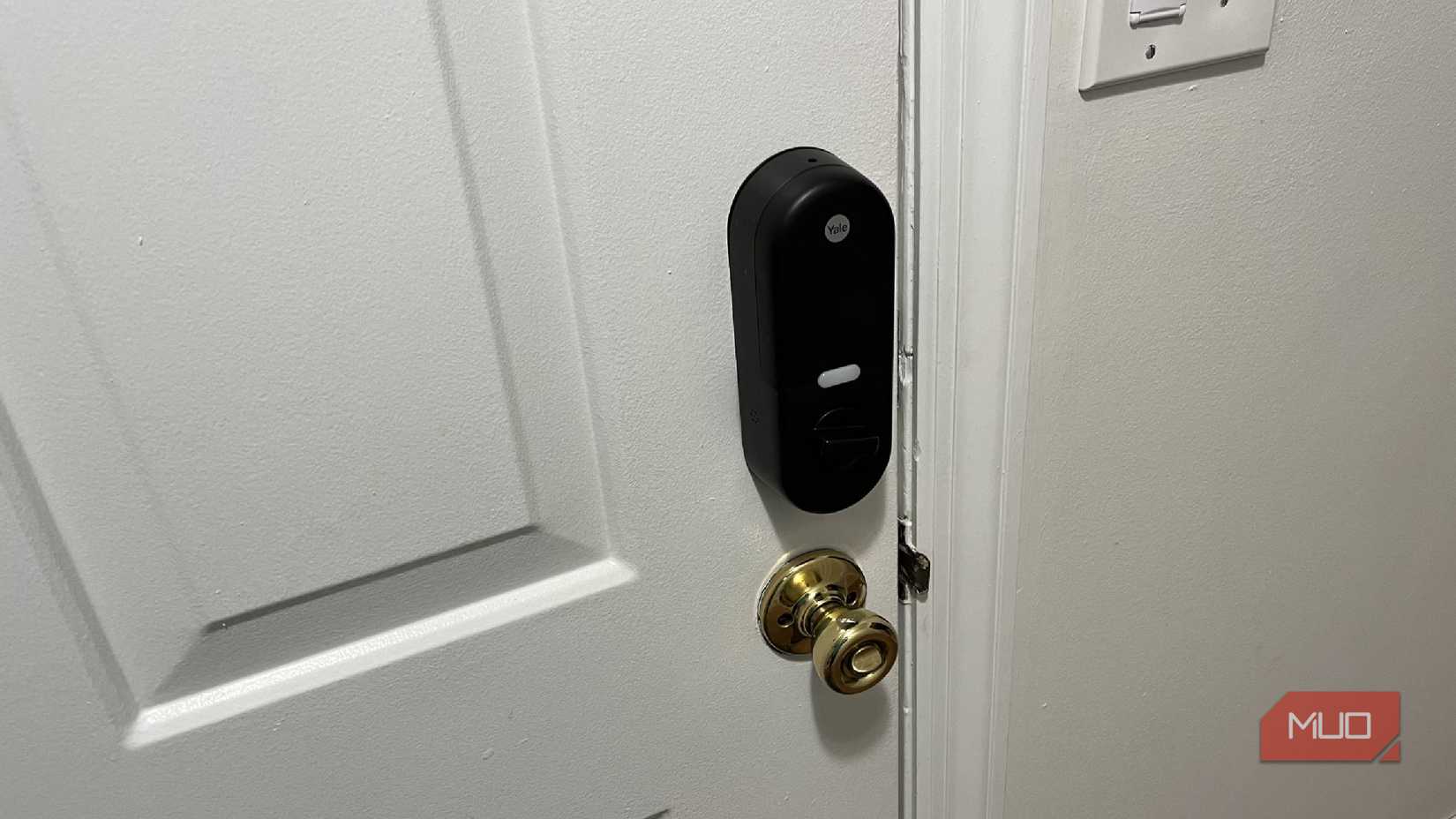 A Yale Smart Lock with a traditional doorknob