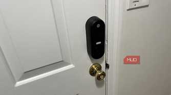 A Yale Smart Lock with a traditional doorknob