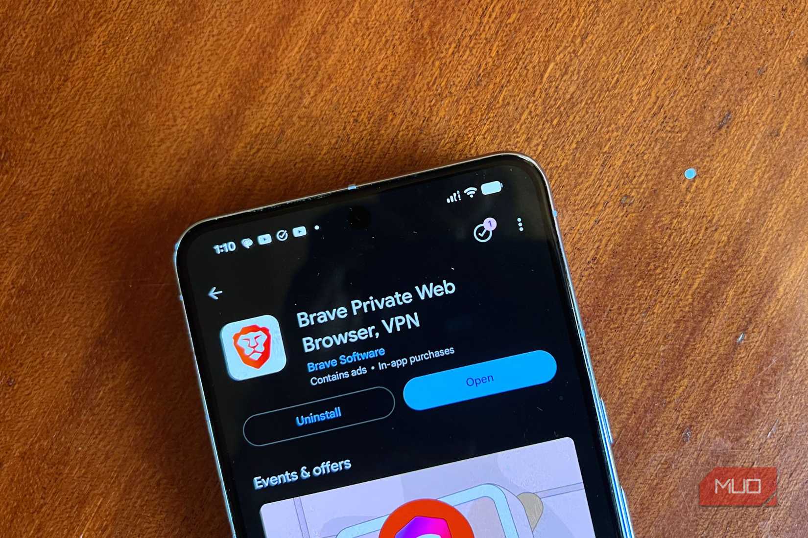 Smartphone displaying Brave browser Google Play Store listing