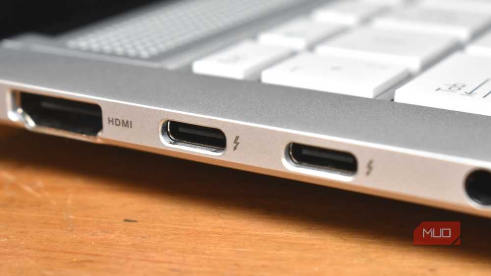 Thunderbolt ports on a laptop, identifiable by the lightning bolt icon