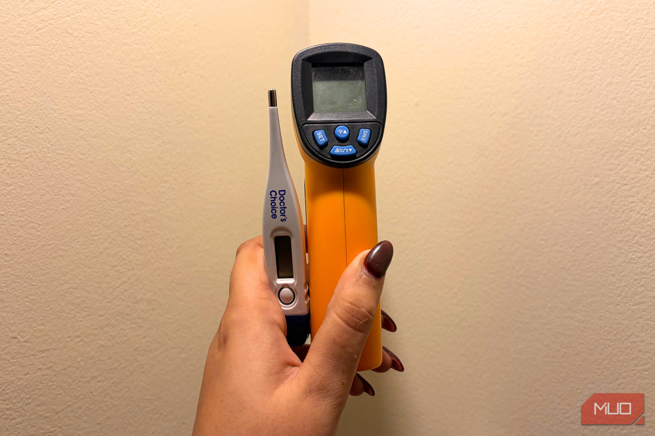 Thermometer on the left and temperature gun on the right