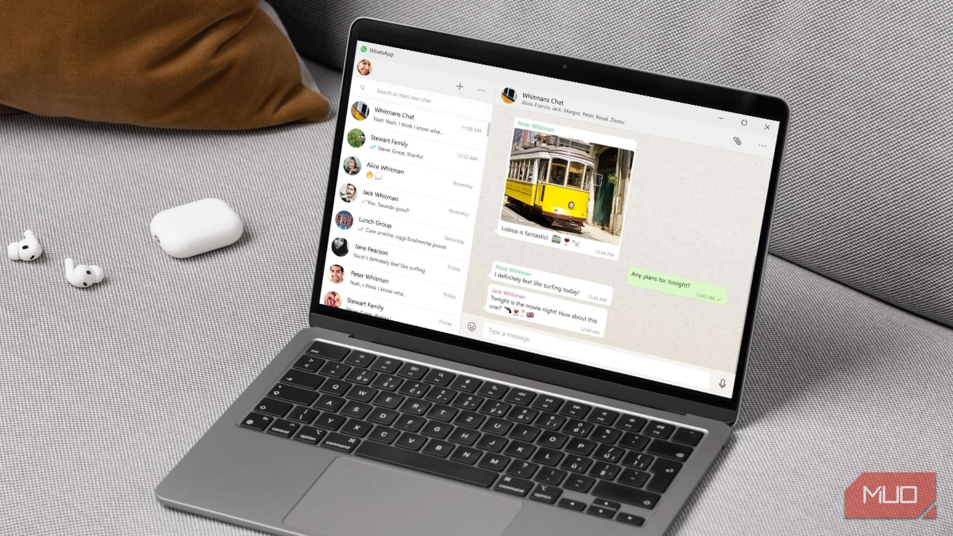 A mockup of MacBook with WhatsApp Web opened