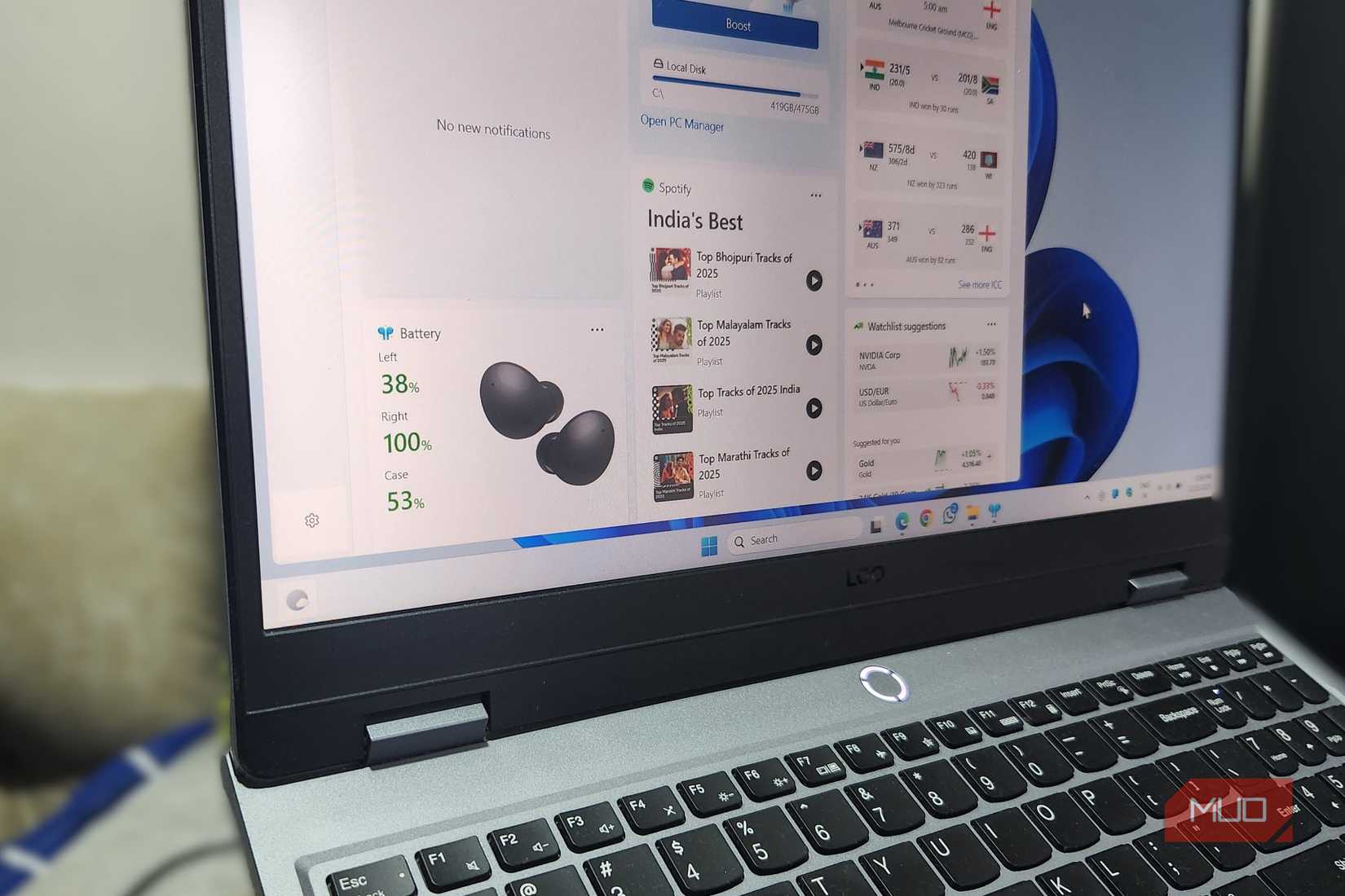 Windows 11 laptop showing the widgets panel