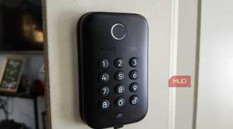 The Wyze lock from an angle, showing off the buttons and finger print reader