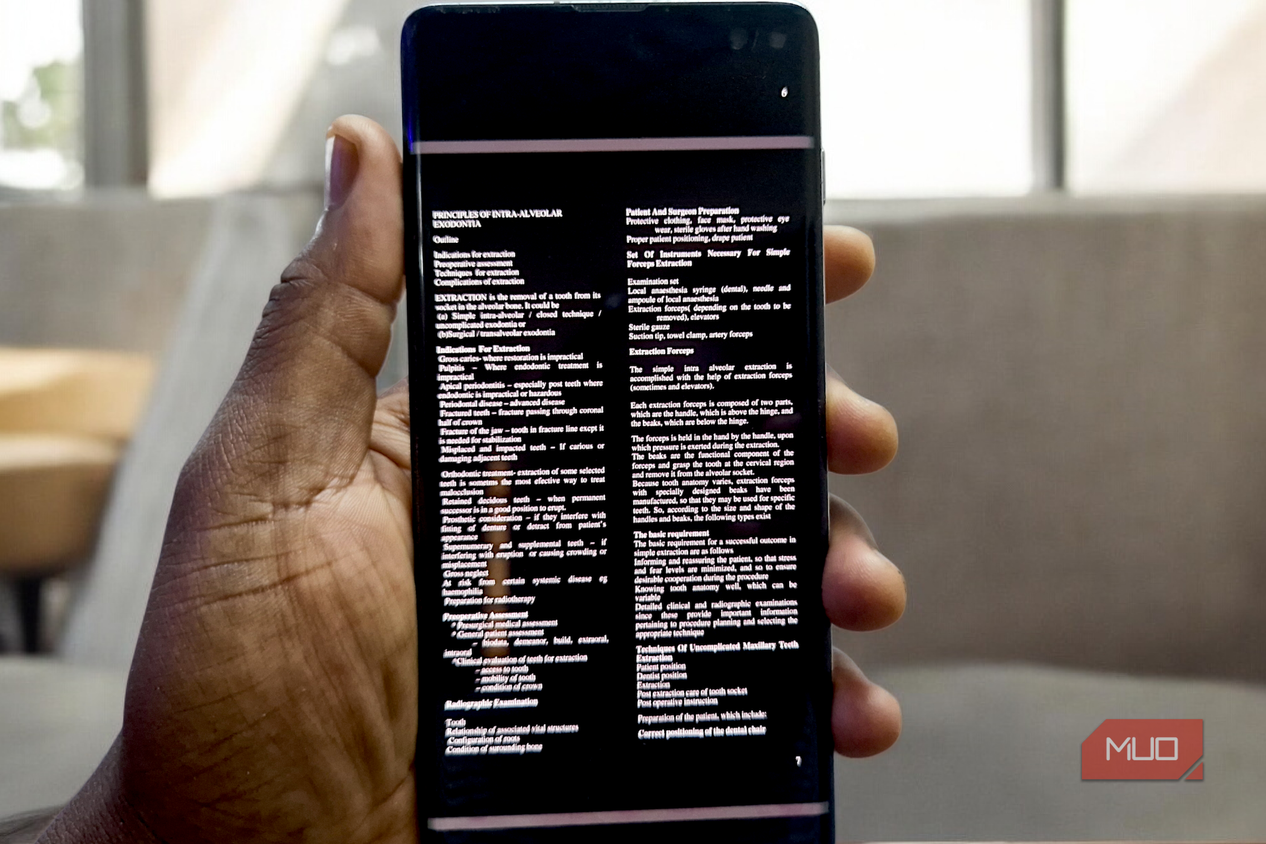 A smartphone displaying a PDF document in dark mode using the MJ PDF reader app.