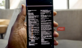 A smartphone displaying a PDF document in dark mode using the MJ PDF reader app.