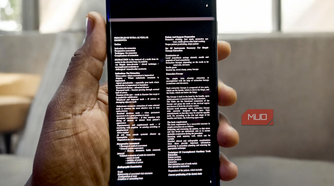 A smartphone displaying a PDF document in dark mode using the MJ PDF reader app.