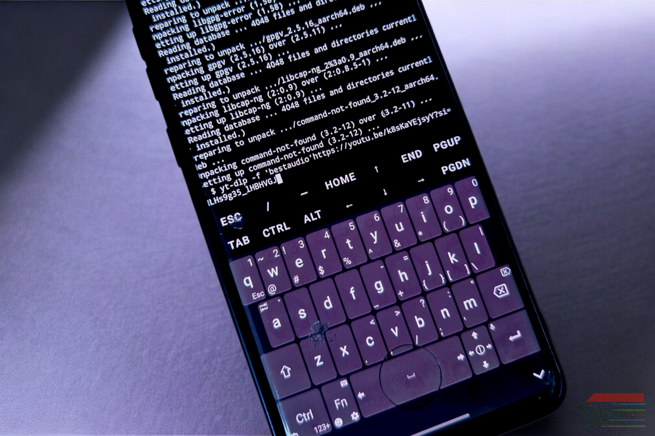 A smartphone screen displaying the Unexpected Keyboard active within a Termux terminal session.