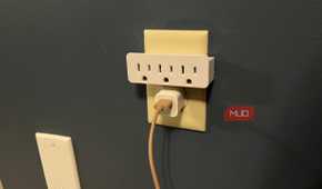 A 3-outlet grounded AC/DC adapter in an outlet