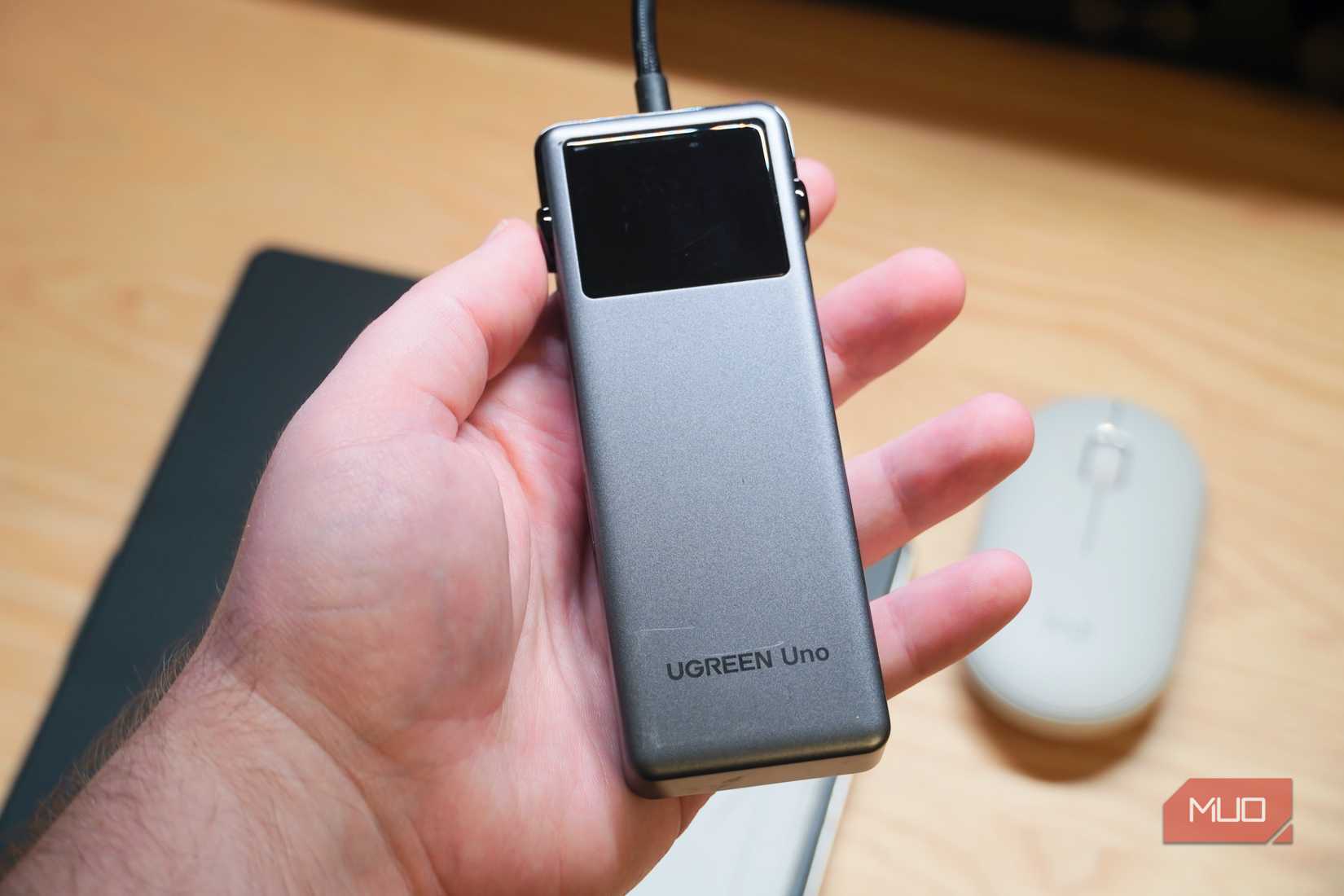Ugreen's Uno USB-C hub in the hand.