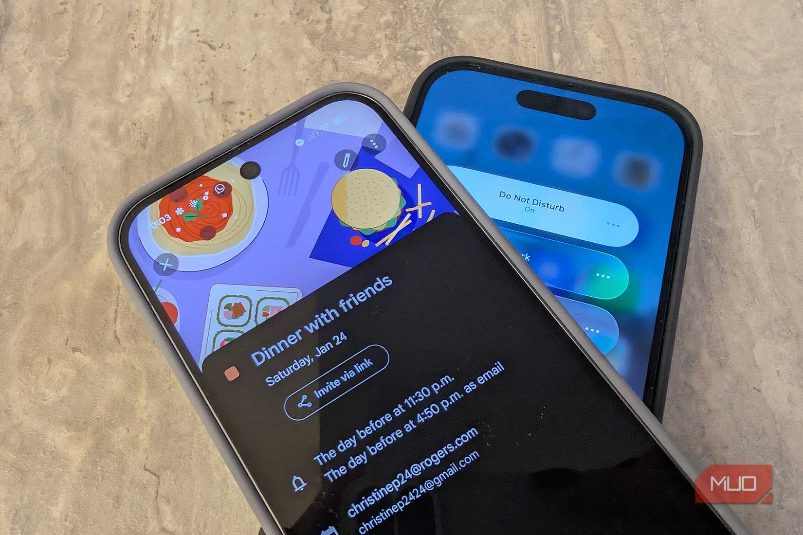 An Android phone showing a calendar appointment atop an iPhone in Do Not Disturb mode.