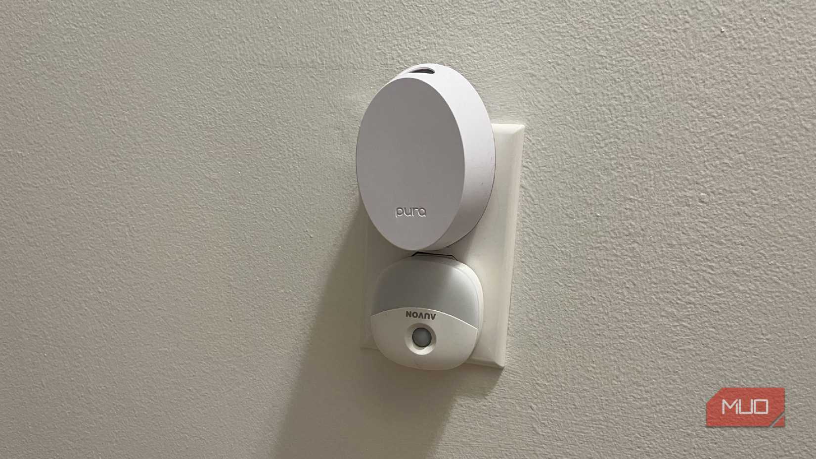 A Pura diffuser in a wall outlet