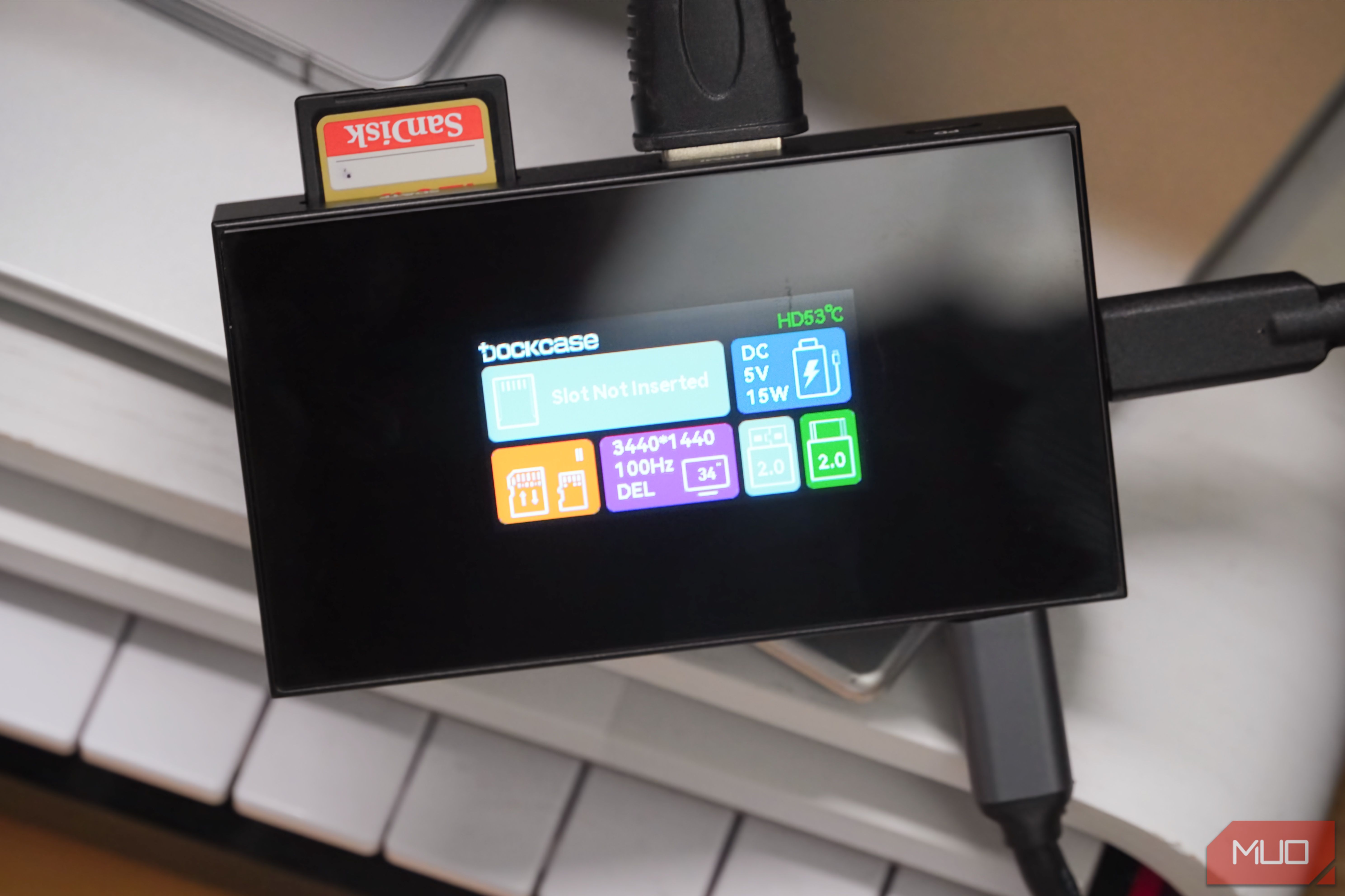 I switched to a USB-C hub with a touchscreen and it's a game-changer for device monitoring