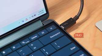 Using a thunderbolt cable to connect a laptop to accessories.
