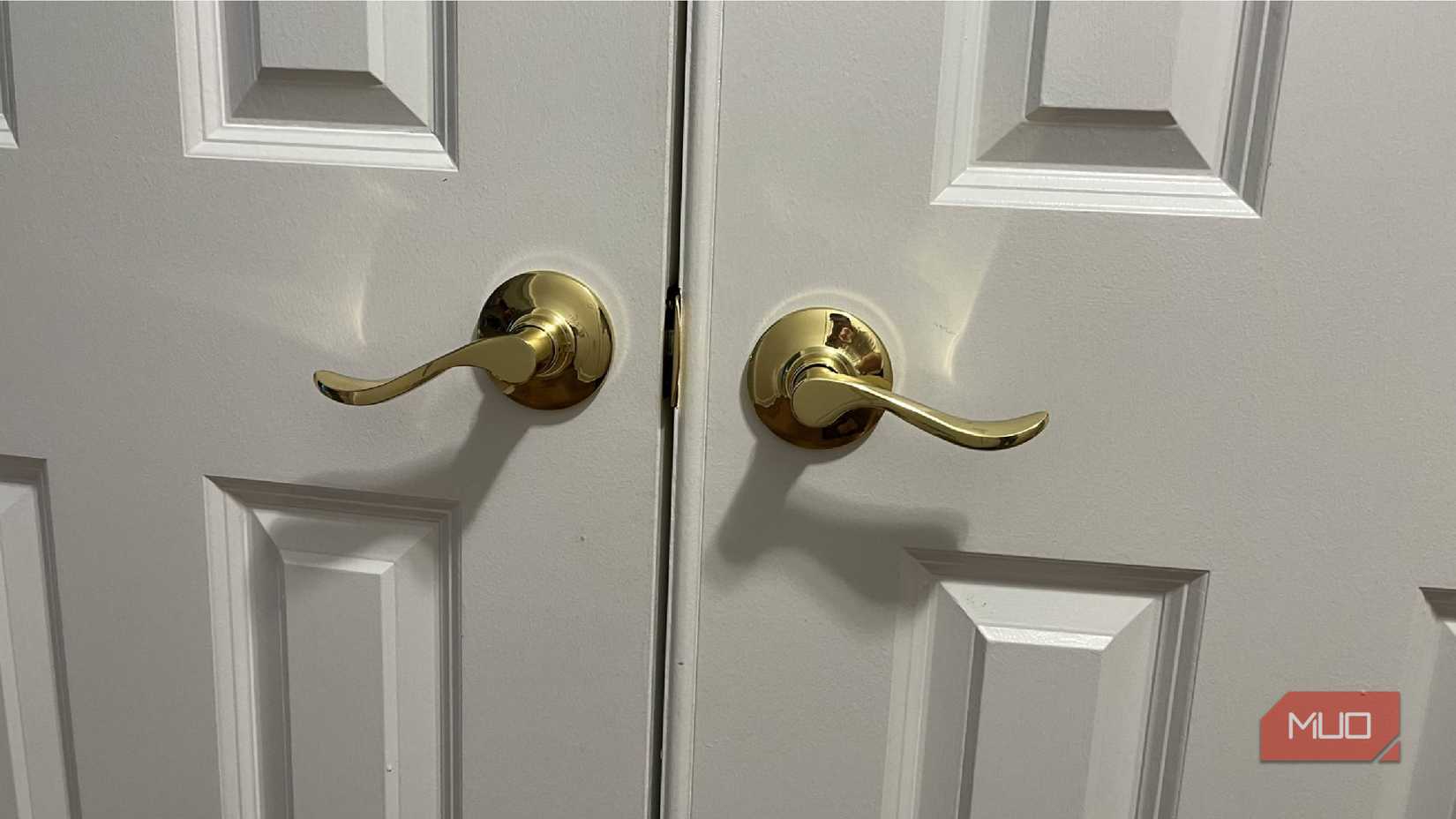 Dual door knobs on two doors
