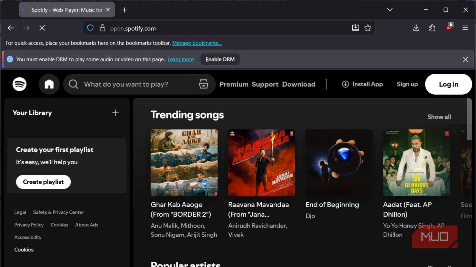 Spotify Web Player in LibreWolf showing a banner asking to enable DRM for audio playback