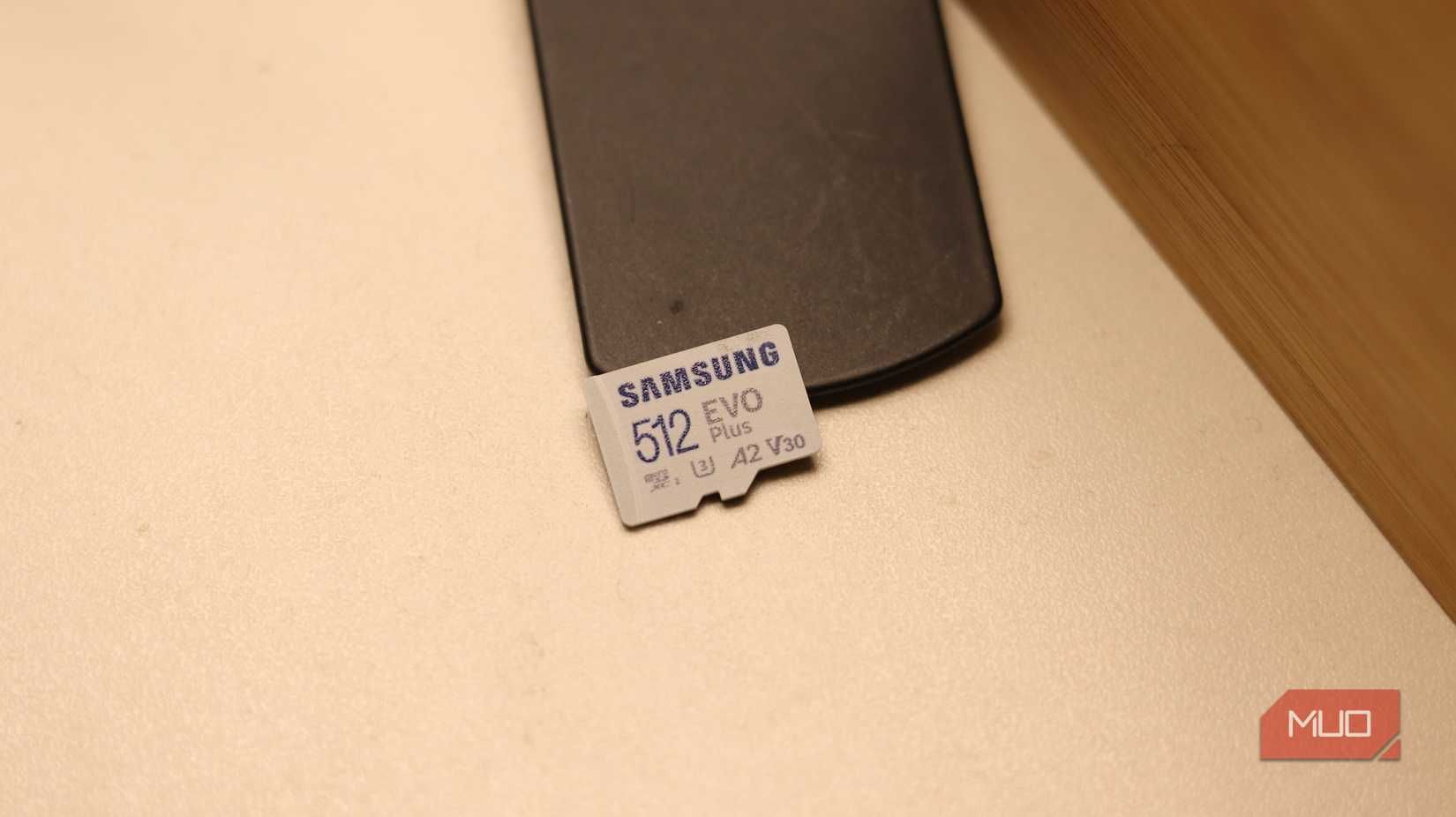 MicroSD card with V30 rating under lamp.