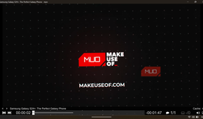 MPV player interface displaying a YouTube tech review video with the MakeUseOf logo and playback controls.