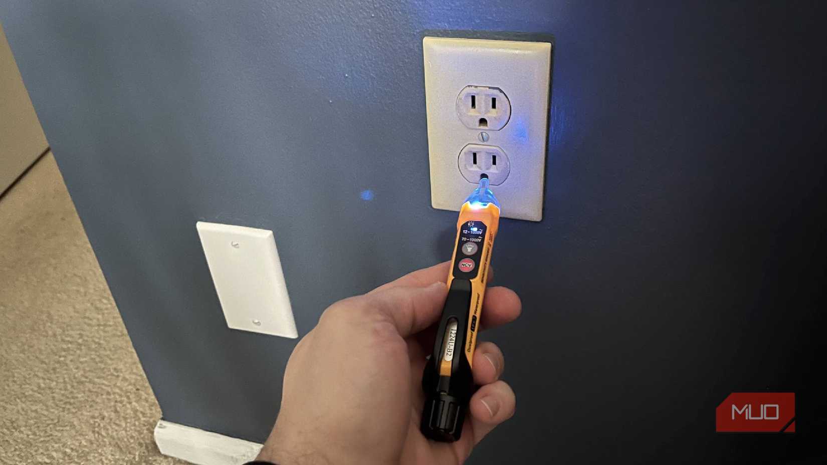 Testing an outlet with a non-contact voltage tester