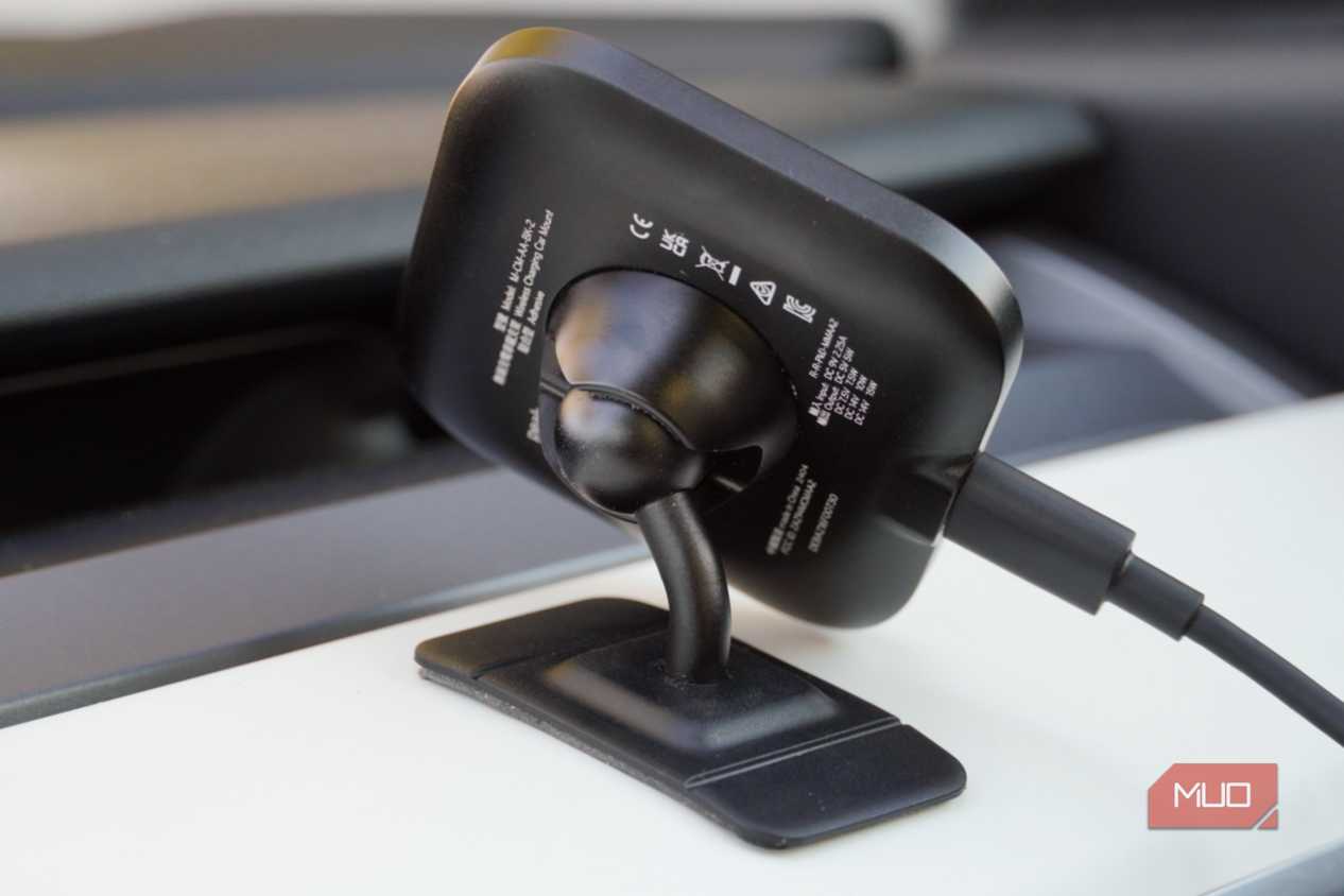 The ballhead mount of a Peak Design Qi2 car charger.