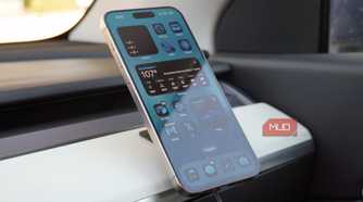An iPhone 15 Pro Max on a Peak Design Qi2 car charging mount.