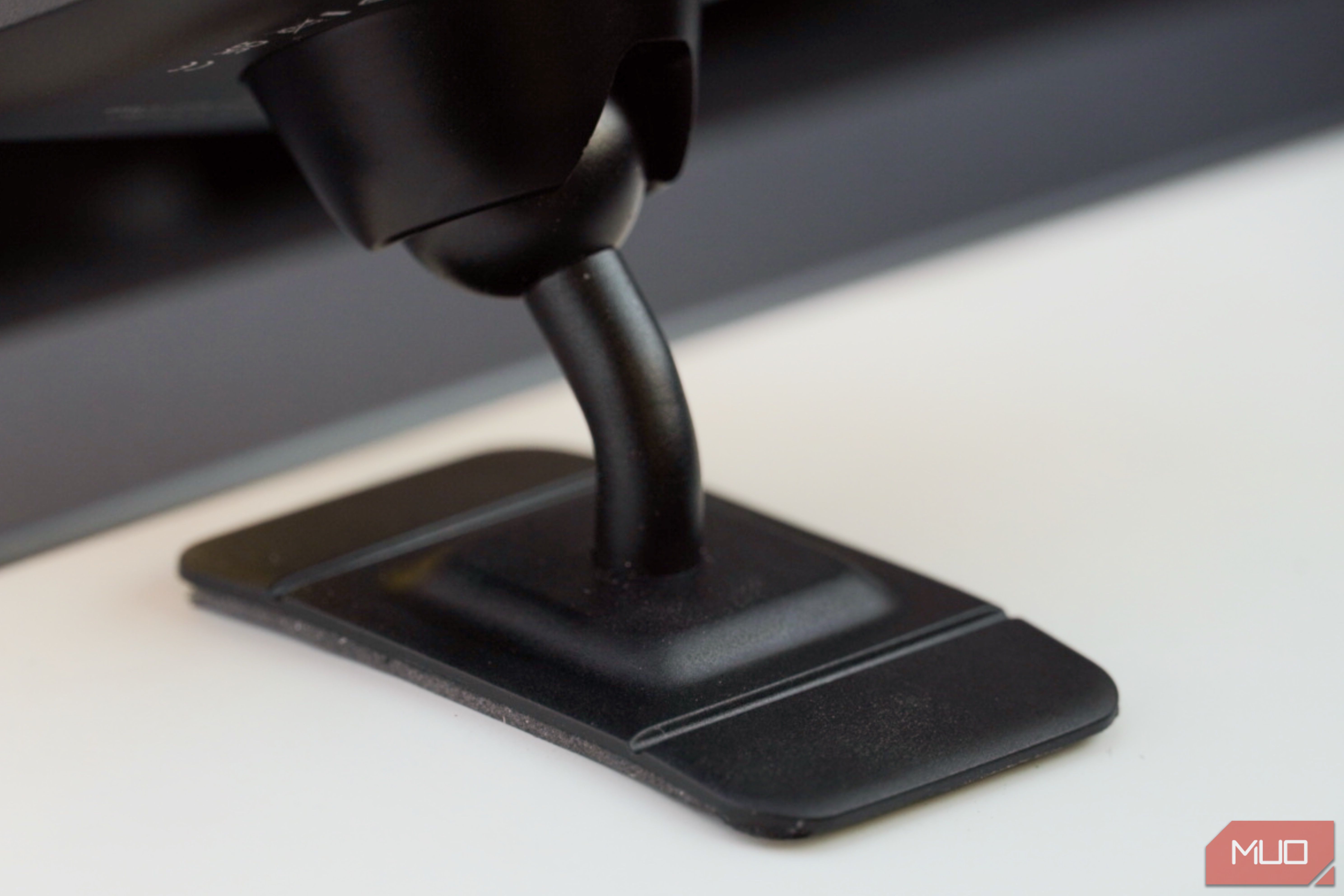 The adhesive pad on a Peak Design Qi2 mount.