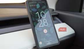 The Google Pixel 7a charging on a Peak Design Qi2 charging mount.