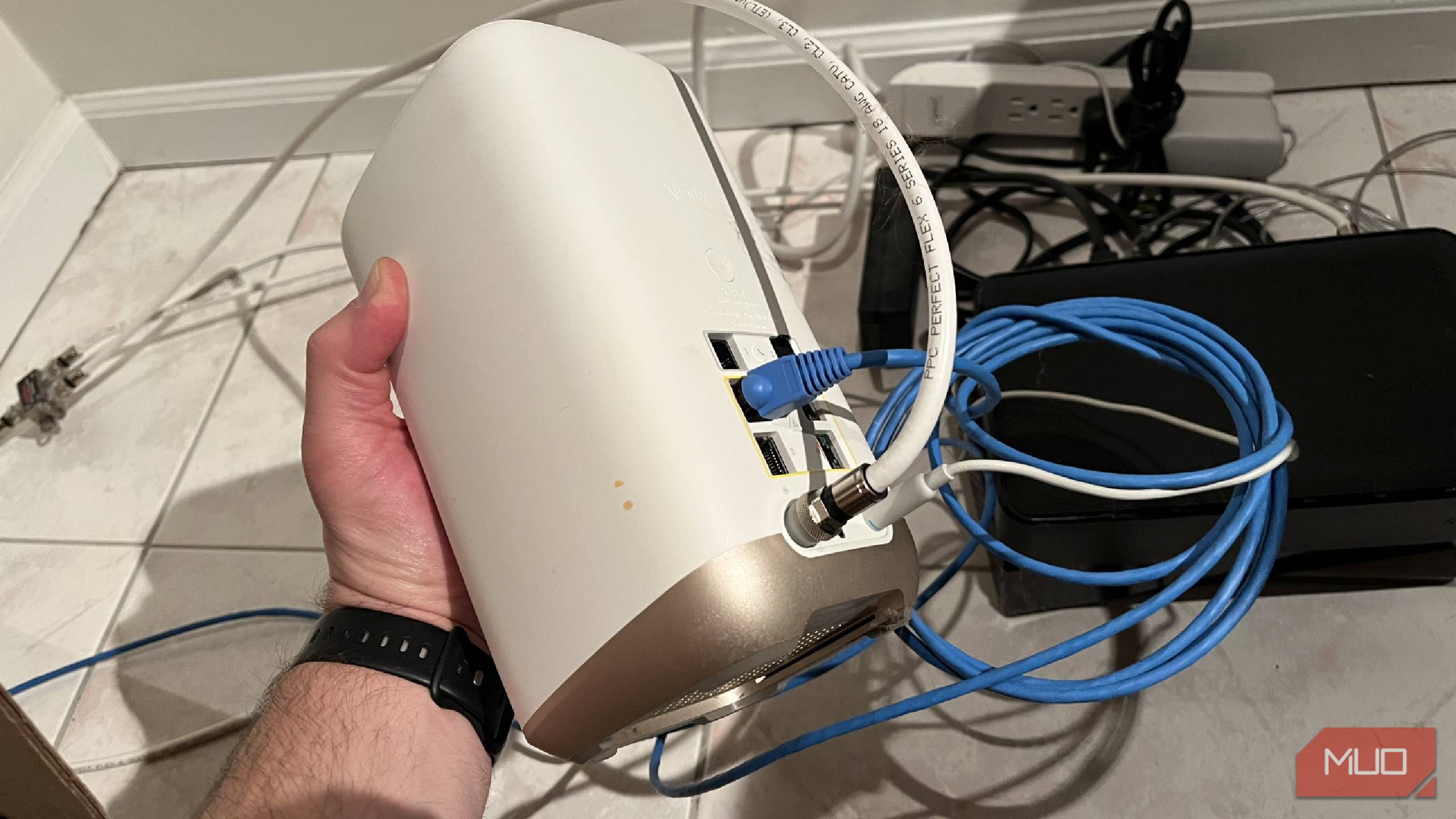 A Wi-Fi router being held
