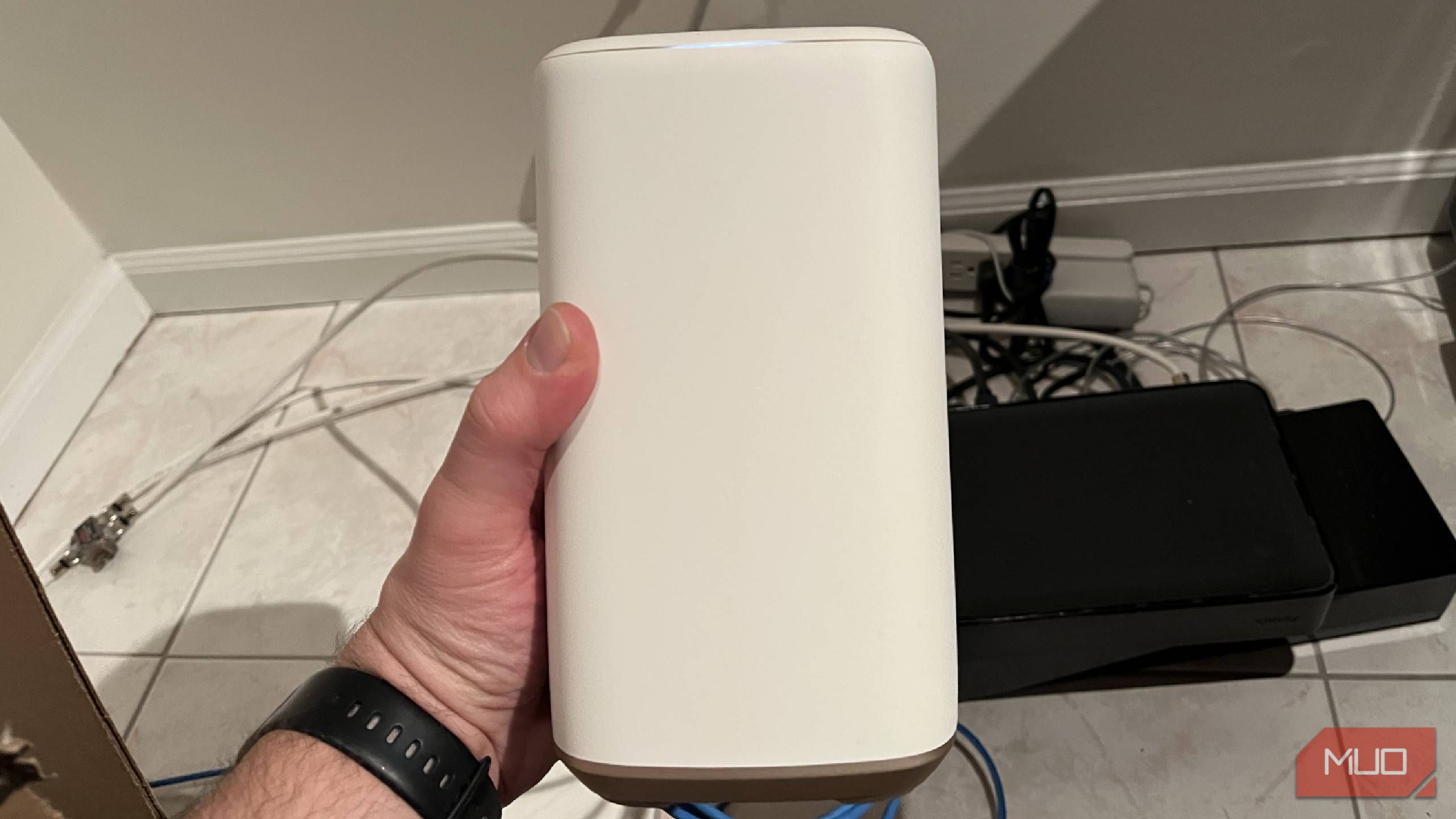 The front of a router while being held