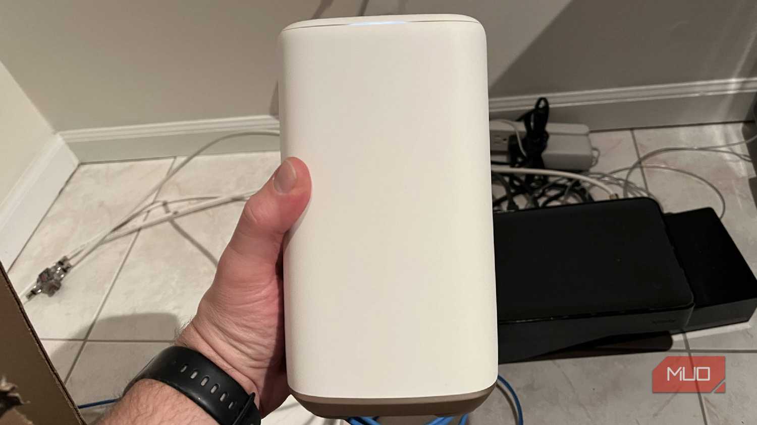 The front of a router while being held