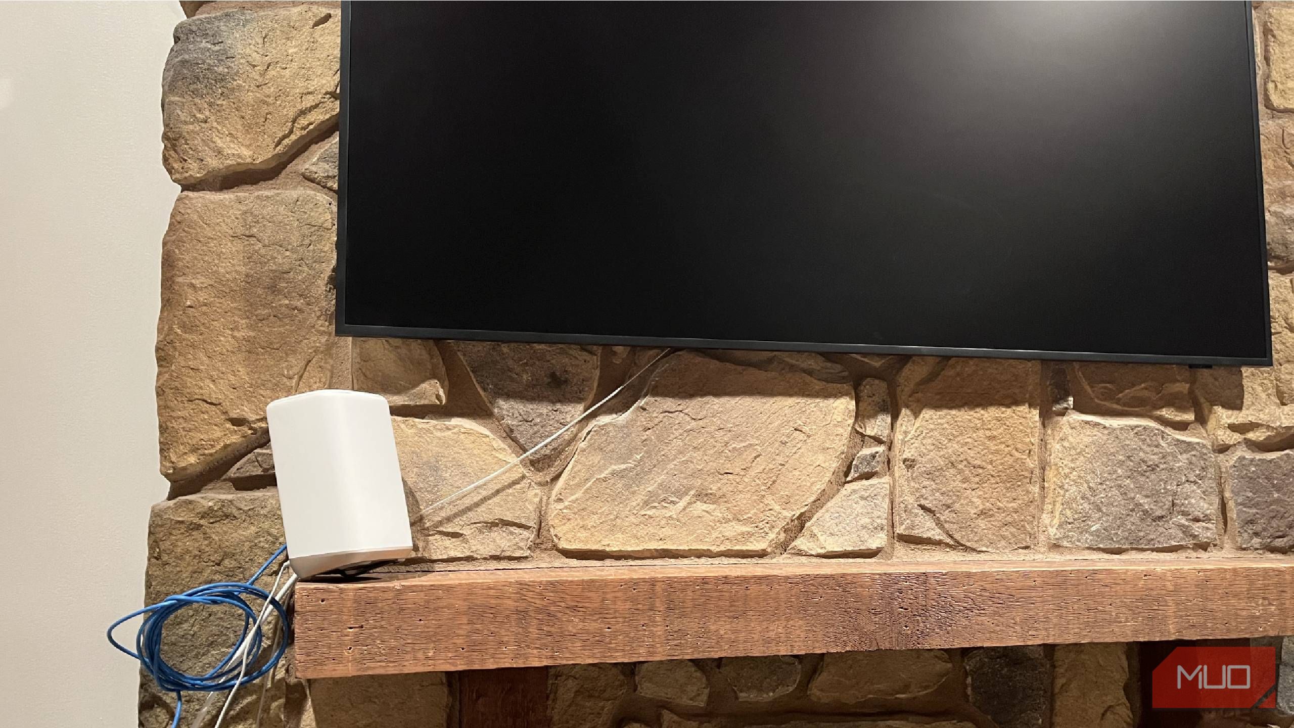 A Wi-Fi router on a mantle